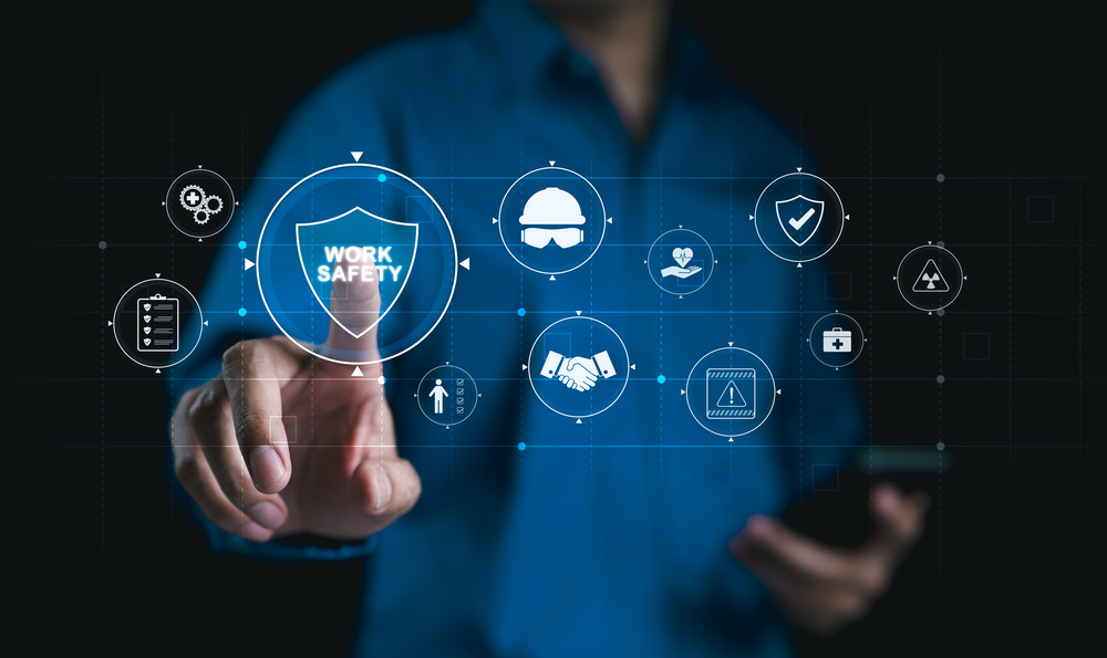 Work Safety and Compliance Concept, Safety First, A person with work safety and compliance icons, including a shield, hard hat, checklist, workplace safety, health protocols, and regulatory compliance